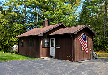 outside of Cedar Cliff Cottage from the driveway by the kitchen door